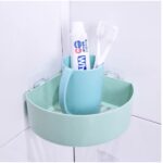 Kệ góc nhà tắm dán tường màu xanh đựng đồ vệ sinh